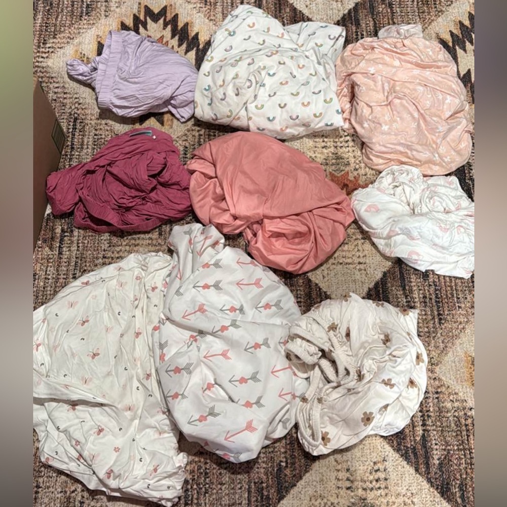 Baby girl crib sheets. 3 bamboo sheets 6 regular cotton sheets. All perfect con